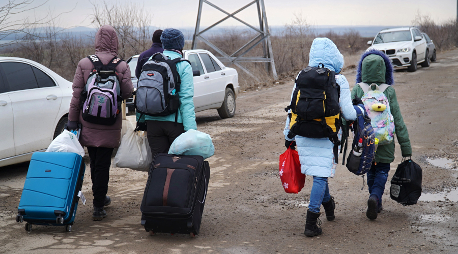 Ukrainian refugees enter Moldova at the Reni-Cahul border crossing point on March 3, 2022.